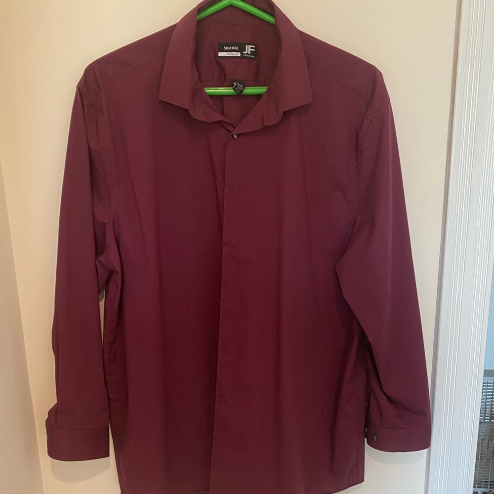 Men’s burgundy button up dress shirt.